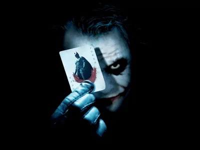 Gloved Hand Raising a Batman Card HD Wallpaper