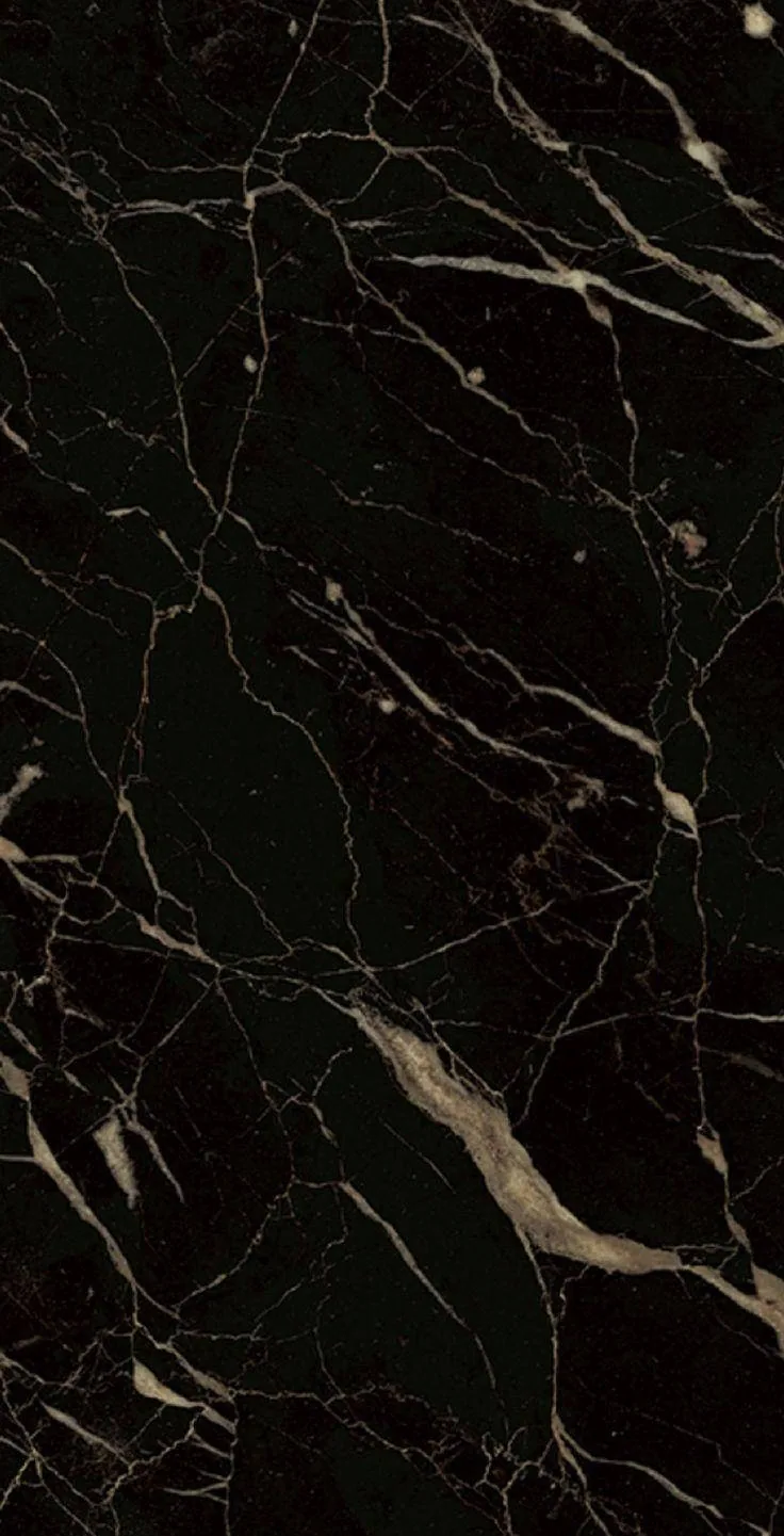 Thin bronze-beige veins cross a deep black slab, one heavier vein cutting the lower-right corner, the top half left dark enough for a lock-screen clock.