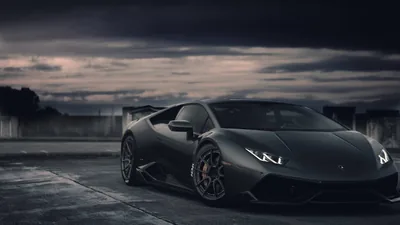 Huracan at Dusk on a Concrete Lot HD Wallpaper