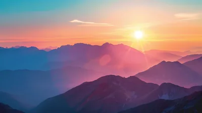 Sunburst Over Hazy Mountain Ridges HD Wallpaper