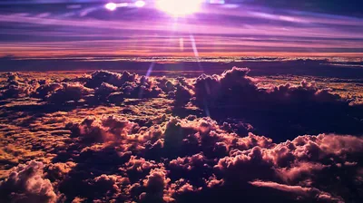 Violet Sun Flare over Cloud Tops HD Wallpaper