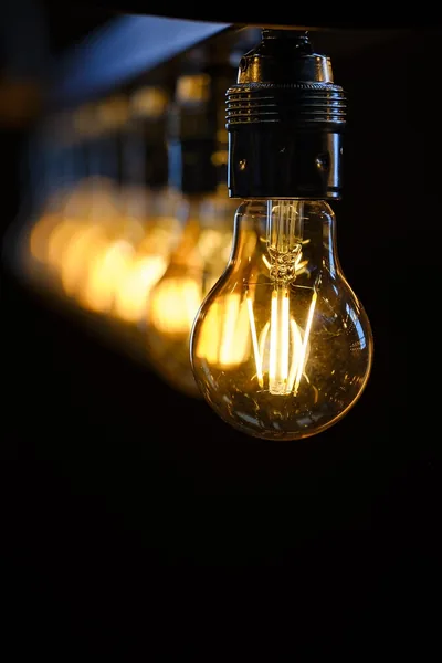 Warm Filament Bulbs in the Dark HD Phone Wallpaper