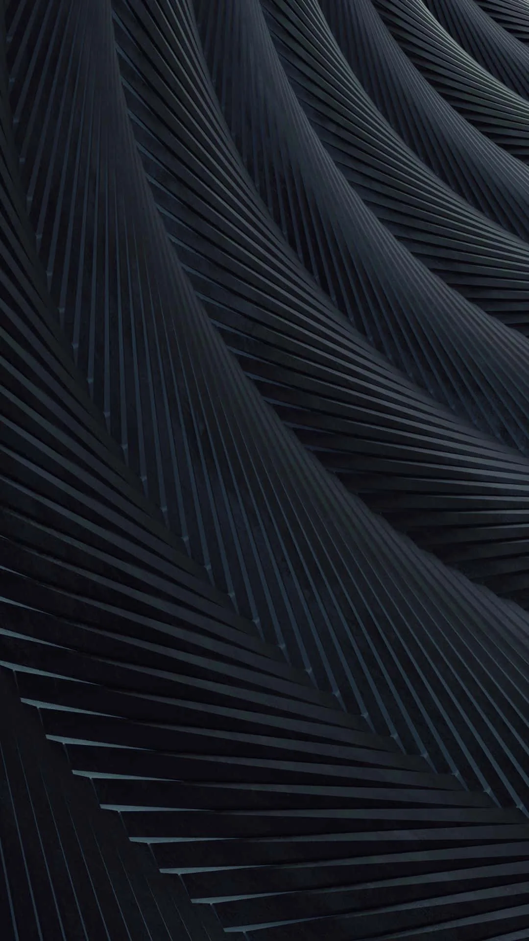 Fans of fine parallel ridges sweep diagonally through this tall frame in midnight blue, cool light catching the top-left crests while the ridges below go dark.