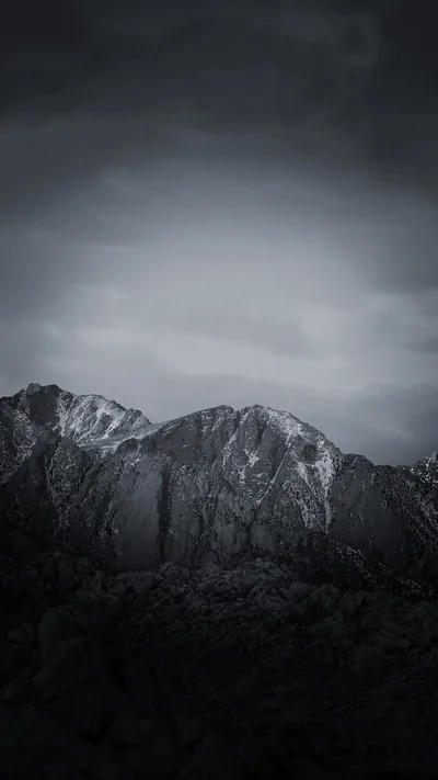 Snowy Mountain Ridge Under Grey Clouds HD Phone Wallpaper