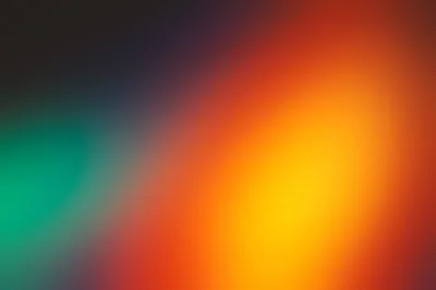 Emerald and Amber Glow on Dark HD Wallpaper