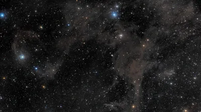 Brown Dust Clouds Across a Star Field HD Wallpaper