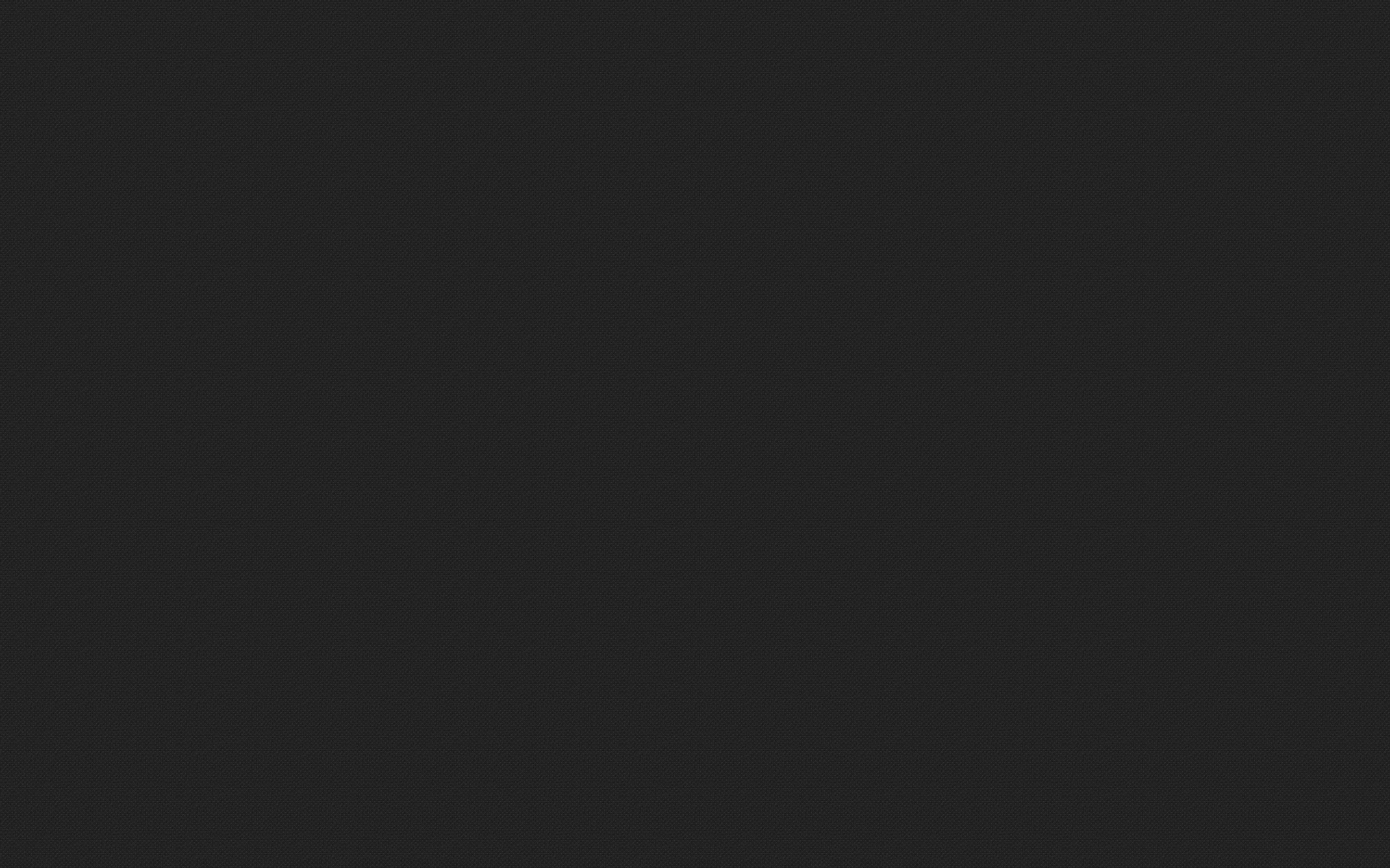 An even wash of dark charcoal with no texture or gradient, a soft alternative to true black for screens and slide backdrops.