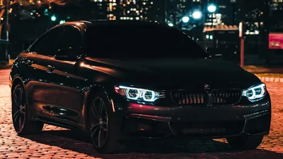 Black BMW 4 Series on a City Street at Night HD Wallpaper