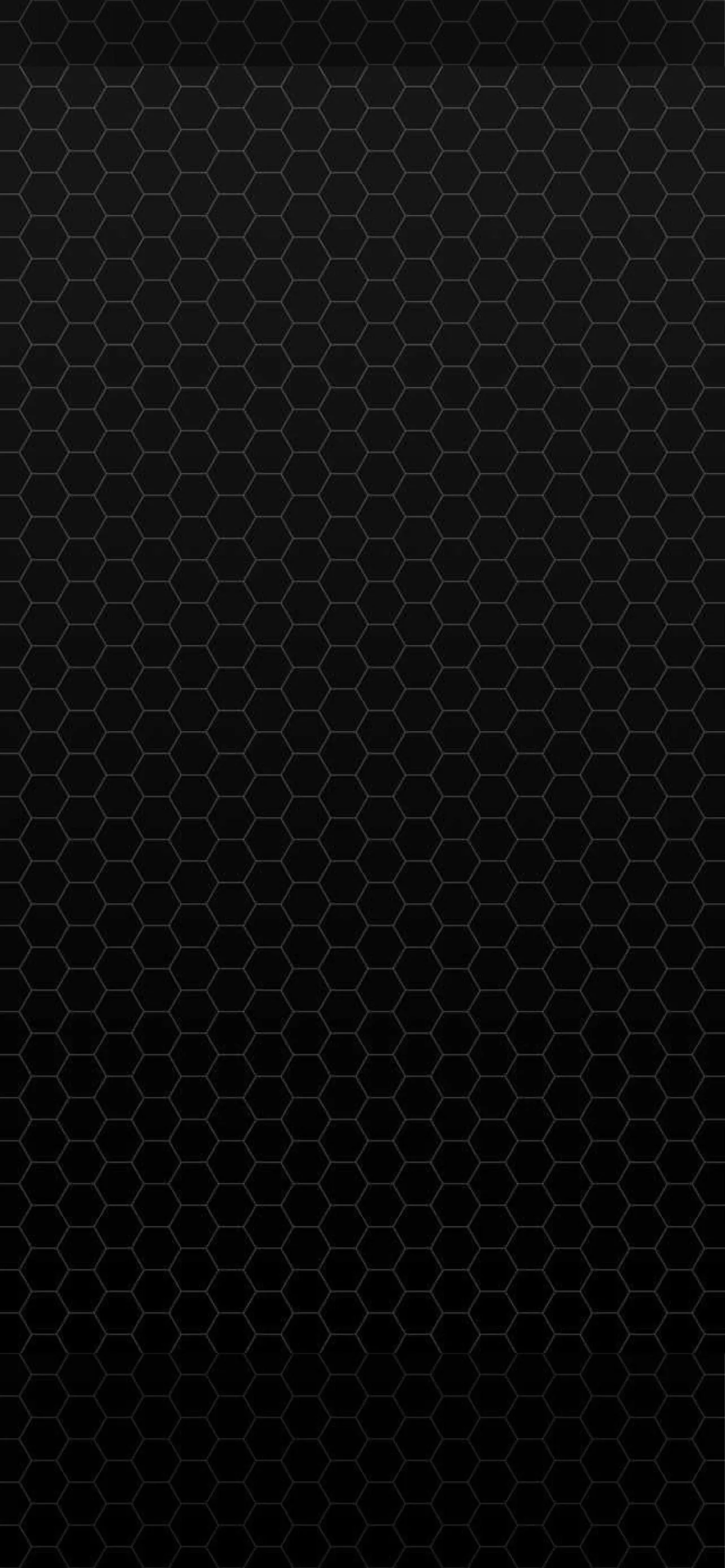 A honeycomb of hexagons covers the full frame in charcoal on black, the outlines just bright enough to read as texture behind app icons.
