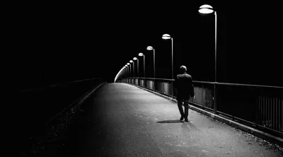 Streetlights Curving Over an Empty Bridge HD Wallpaper