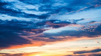 Sunset Clouds in Navy and Gold HD Wallpaper