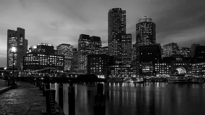 Waterfront Skyline at Dusk with Pier Posts HD Wallpaper