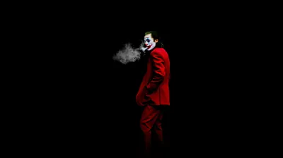 Lone Joker Exhaling Smoke on Black HD Wallpaper