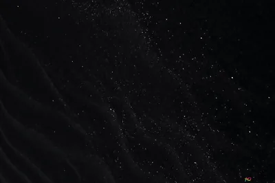 Abstract Black Wavy Background With Glittering White Dust Particles