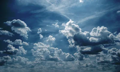 Steel Blue Sky with Scattered Clouds HD Wallpaper
