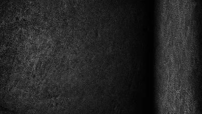Rough Black Wall with a Lit Edge HD Wallpaper