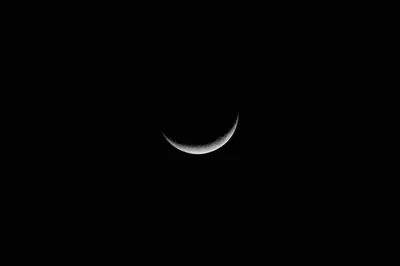 Thin Crescent Moon in a Black Sky HD Wallpaper