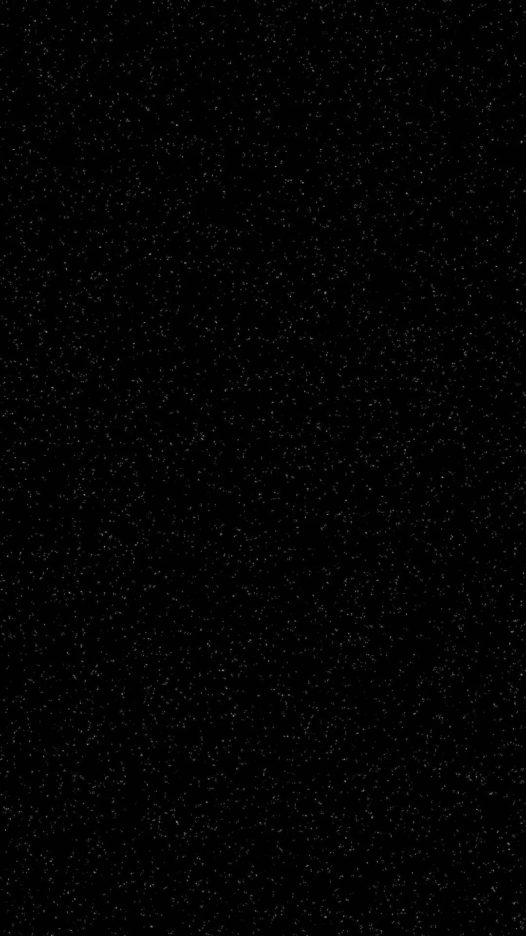 A dense scatter of tiny white specks across a pure black field, like grain or very distant stars, even enough to sit under icons.