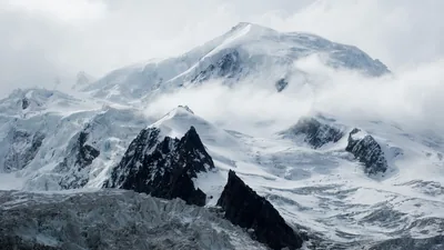 Icy Massif Shrouded in Cloud HD Wallpaper