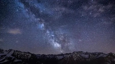 Galaxy Core over a Snowy Ridge HD Wallpaper