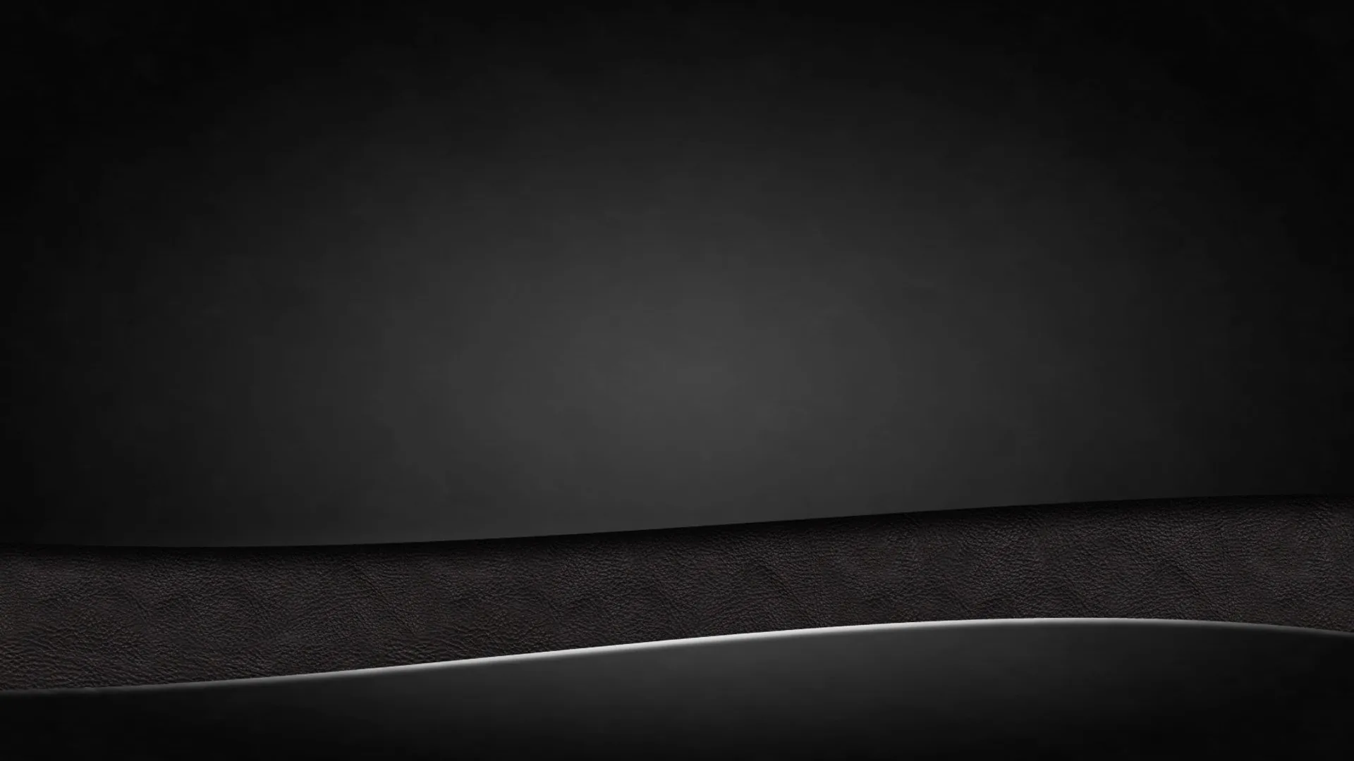 A single white line sweeps across the lower third of a charcoal background, separating a smooth field above from a rougher band below.