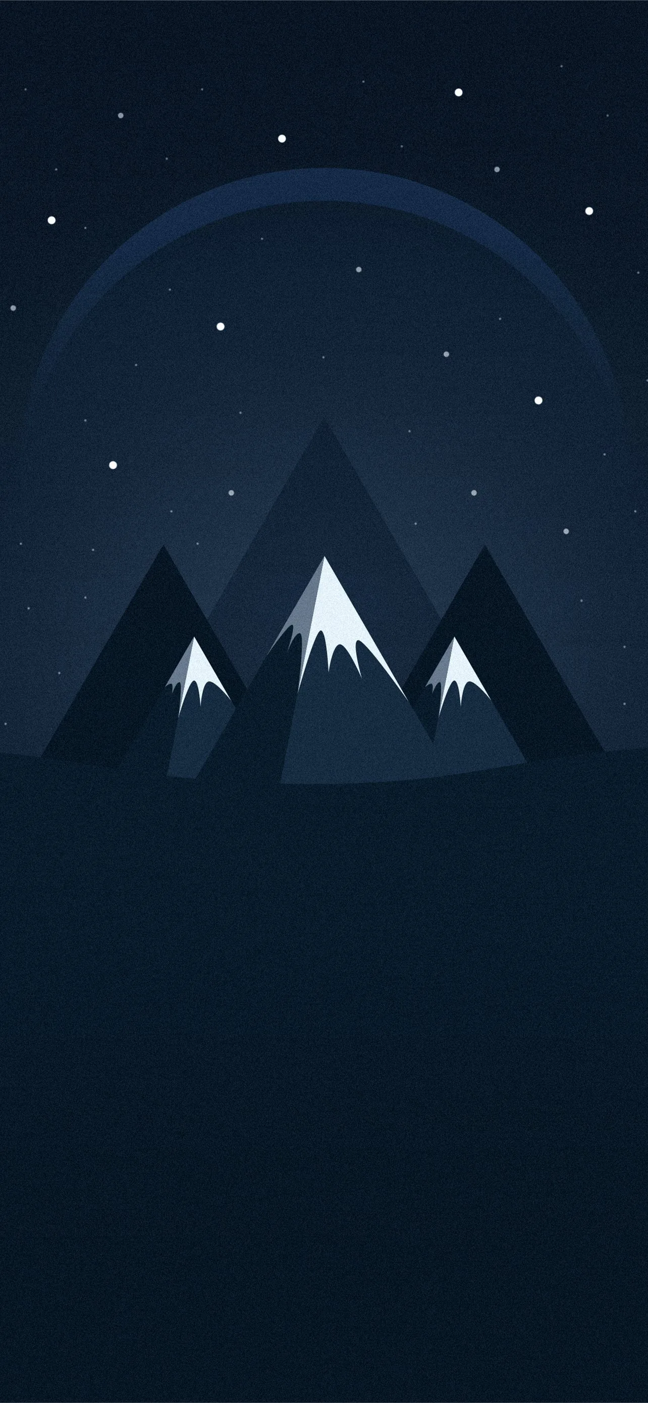 Three flat triangle peaks with white caps rise under a starry navy sky, a huge faint circle glowing behind them, and the foreground beneath stays nearly solid dark.
