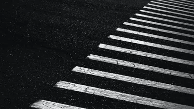 Crosswalk Stripes on Dark Asphalt HD Wallpaper