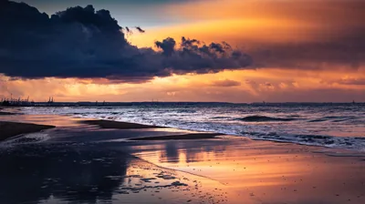 Sea Beach Waves Sand Under Black Clouds Sky During Sunset 4K HD Nature Wallpapers