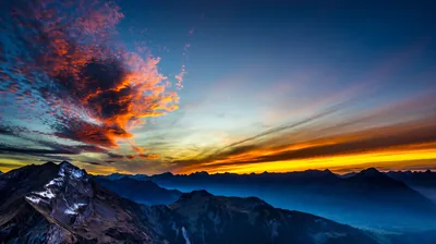Burning Clouds Over Alpine Peaks HD Wallpaper