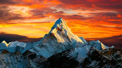 Himalayan Summit Under a Fiery Sky HD Wallpaper