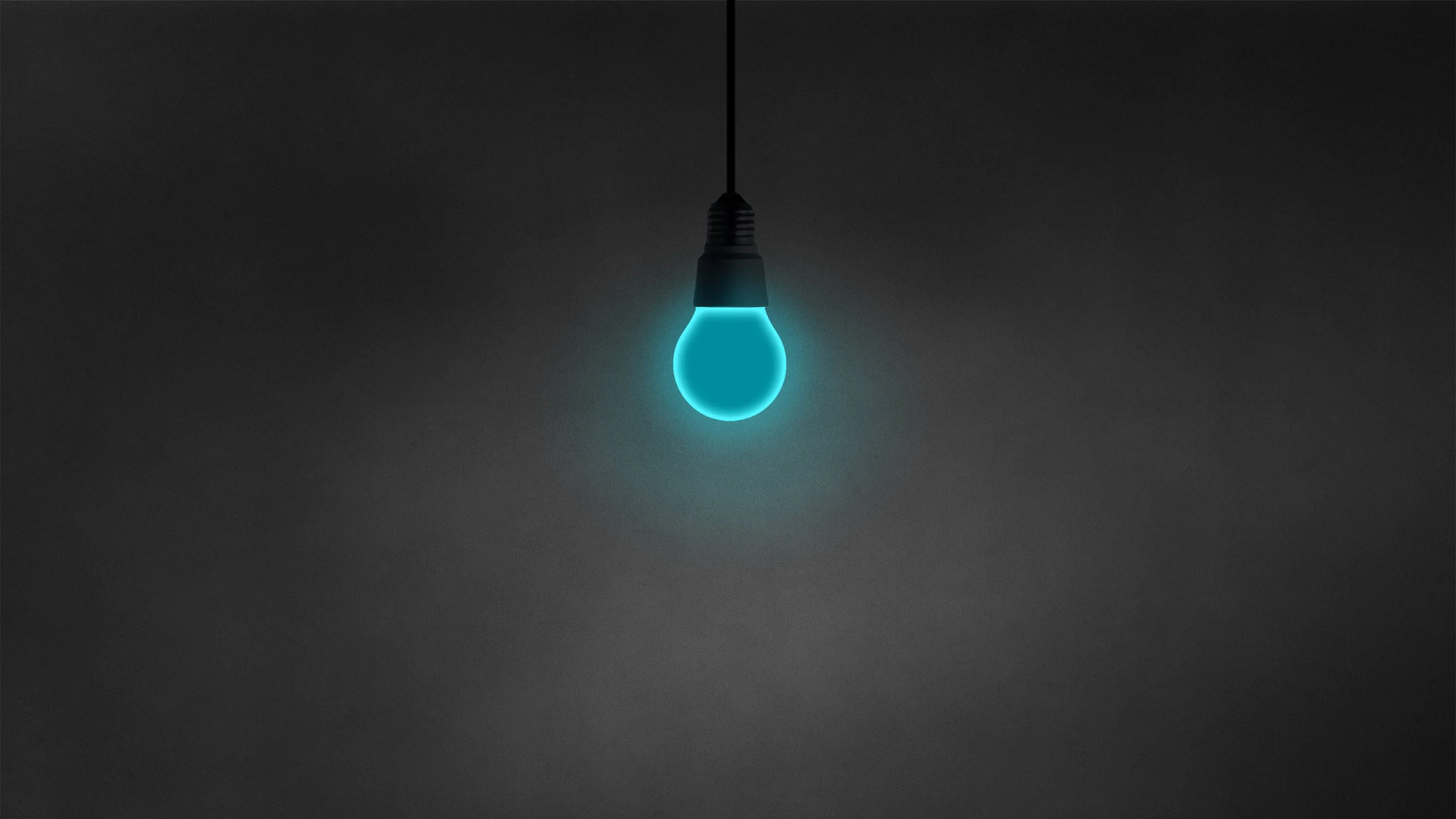 A single cyan bulb hangs from a cord at top centre, its glow fading into a plain dark grey wall that leaves the lower half free for icons.