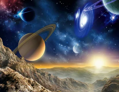 Ringed Planets Over a Rocky Valley HD Wallpaper