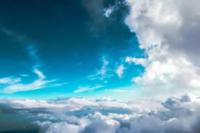 Cloud Tops Under a Turquoise Sky HD Wallpaper