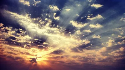 Golden Sun Rays Through Storm Clouds HD Wallpaper