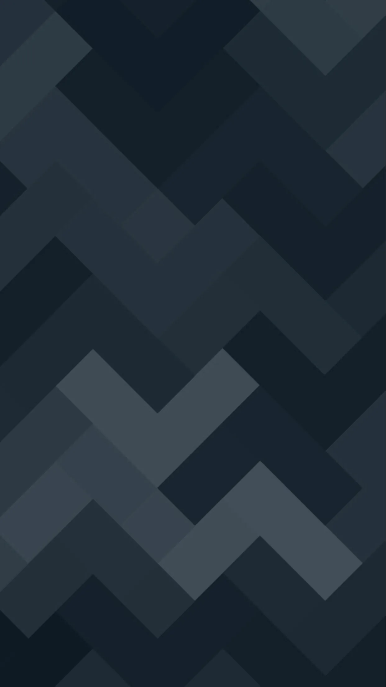 Zigzag chevron rows in stepped blue-grey shades tile the whole frame with no focal point, so icons and the clock can land anywhere without covering anything.