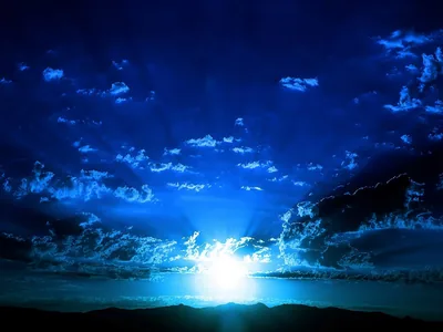 Sunburst Through Blue Storm Clouds HD Wallpaper