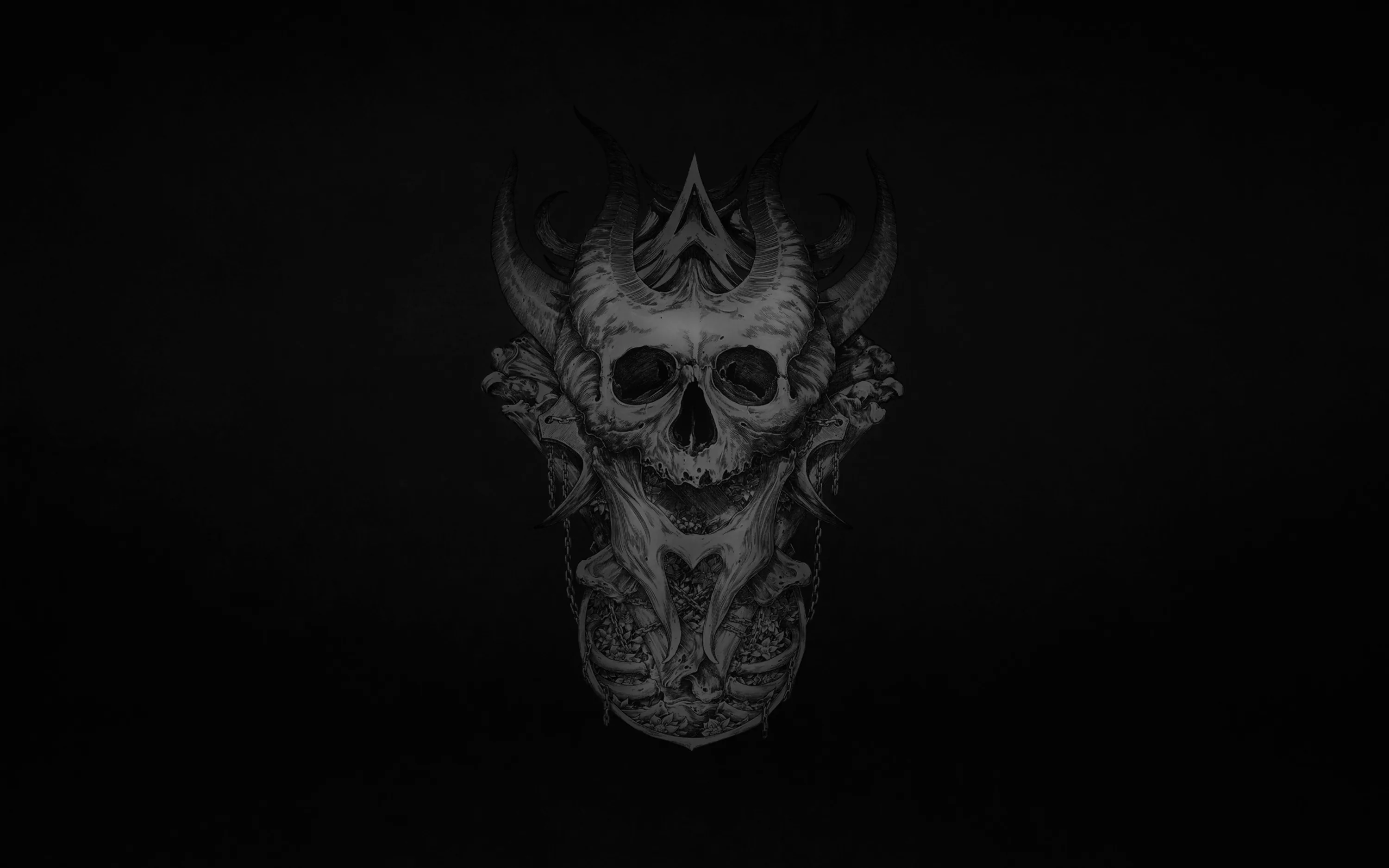 The same carved demon skull sits small at the centre of a wide, softly lit charcoal field, corners dropping to full black.
