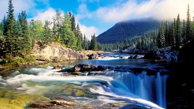 Silky Rapids Below a Dark Mountain HD Wallpaper