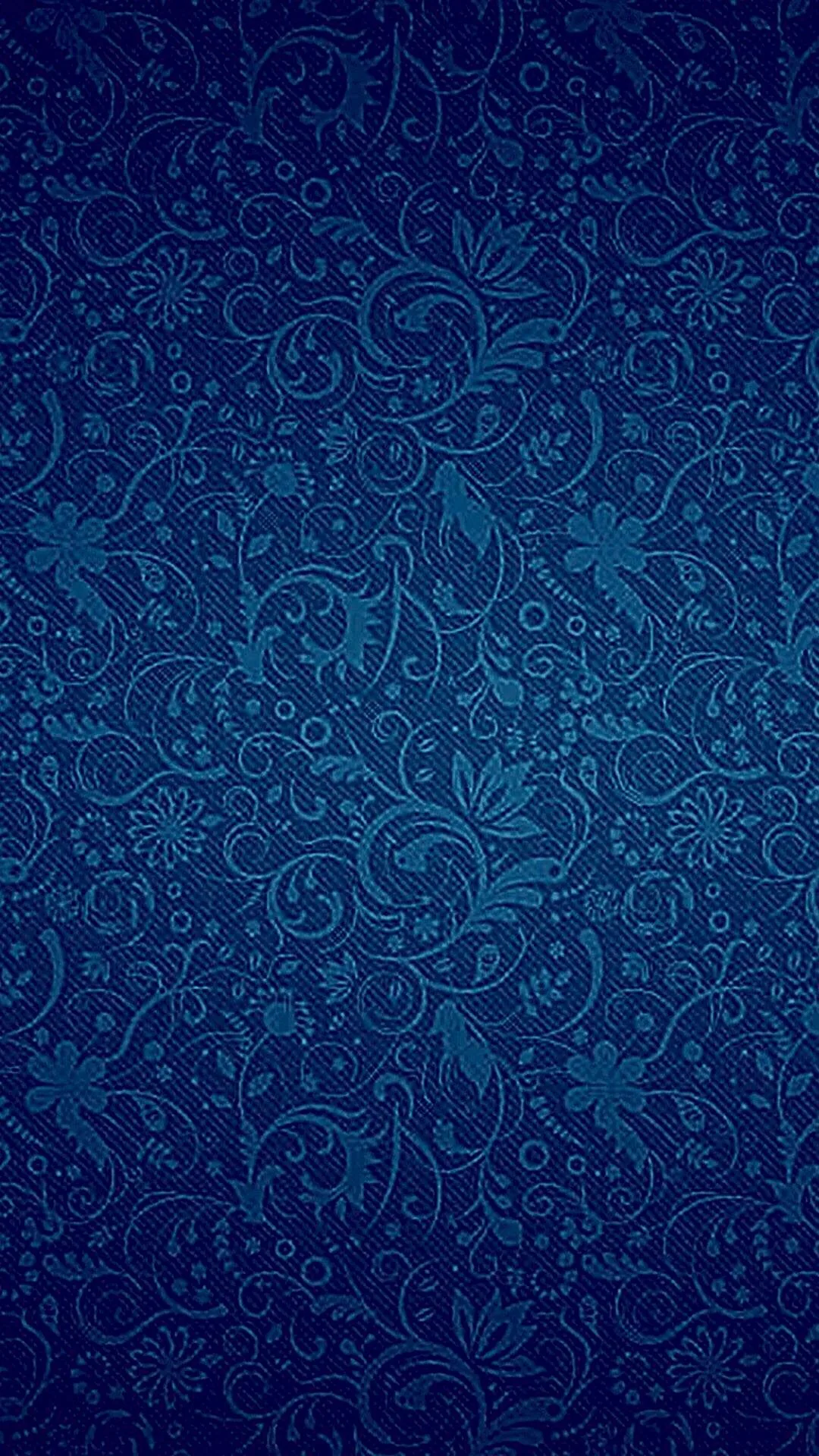 Teal vines, leaves and pinwheel blossoms repeat densely over dark navy in a portrait layout, the tone even enough that a clock reads anywhere.