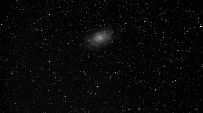 Distant Spiral Galaxy in Black and White HD Wallpaper