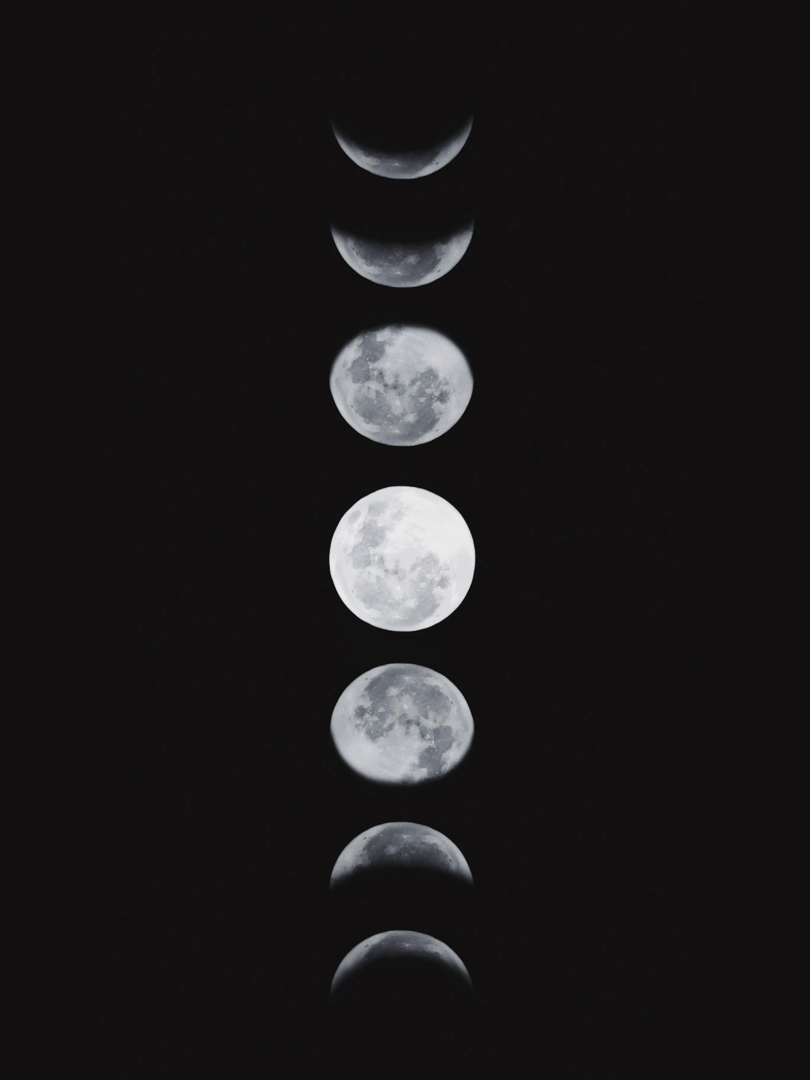 Phases run top to bottom from thin crescent to bright full disc and back, wide black margins on either side of the column.