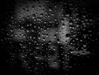Rain Drops on a Window at Night HD Wallpaper
