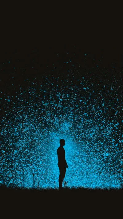 Silhouette in a Blue Particle Burst HD Phone Wallpaper