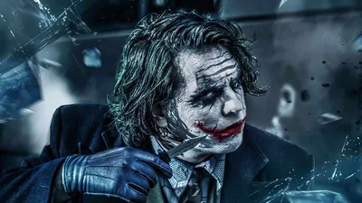 Shattered Glass Around a Suited Joker HD Wallpaper