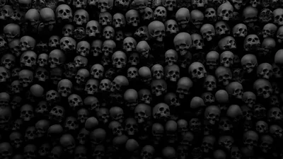 Wall of Grey Skulls in Low Light HD Wallpaper