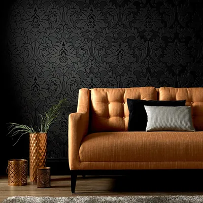 Orange Sofa Against Black Damask Wall HD Wallpaper
