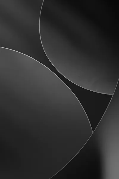 iOS 26 Black Circles HD Phone Wallpaper