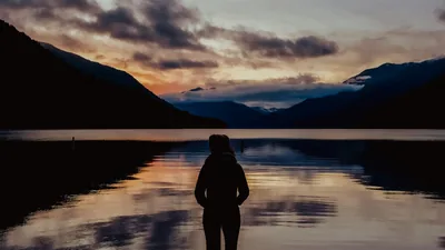 Girl Is Standing Alone In Mountains Black Clouds Sky Background HD Alone Wallpapers