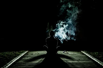 Cross-Legged on Railway Tracks at Night HD Wallpaper
