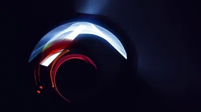 Light Streak Across a Glossy Black Curve HD Wallpaper